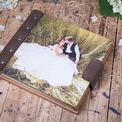 Guest book with UV printing. Made out of wood and genuin leather. Wedding guest book.