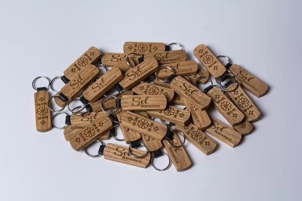 Key chains, made out of oak wood and genuine leather. Corporate client order.