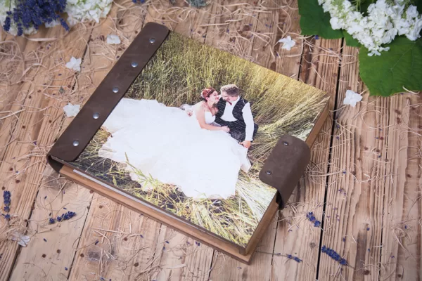 Guest book with UV printing. Made out of wood and genuin leather. Wedding guest book.