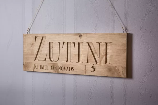 Personalised wooden sign with engraving – made out of spruce.